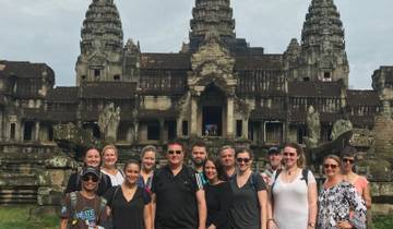 Group of people in front of Angkor Wat.