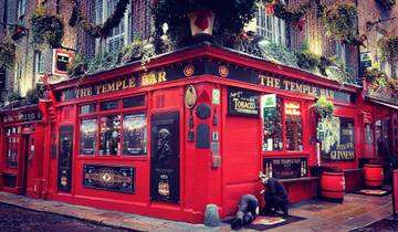 Iconic red pubs in a bustling city street.