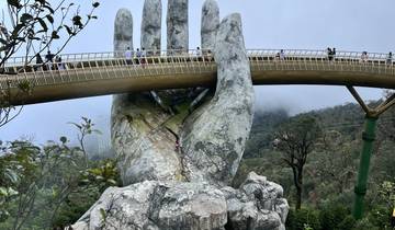 Golden Bridge with giant hand sculpture