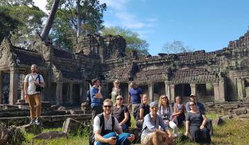 Group in front of ancient ruins.