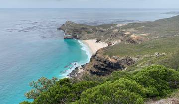 Beautiful coastal landscape with clear turquoise water and cliff.