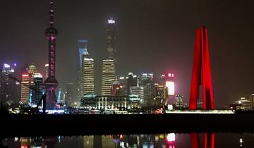 Shanghai's skyline lit up at night.