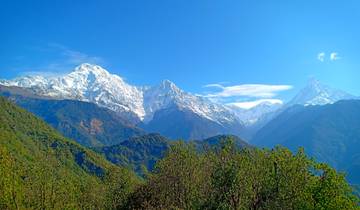 Panoramic view of mountain range and clear skies.