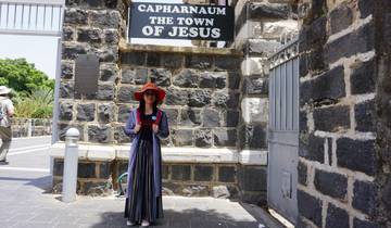 Person in traditional dress standing in Capernaum.
