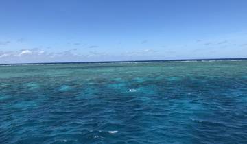Clear blue ocean waters under a sunny sky.