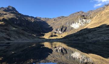 Beautiful mountain landscape reflected in a tranquil lake.