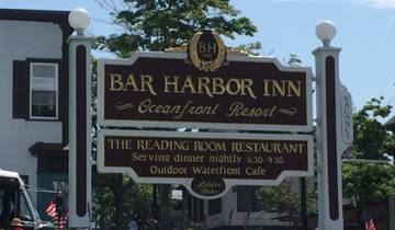 Bar Harbor Inn sign with detailed offerings.
