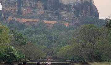 People walking towards Sigiriya rock.