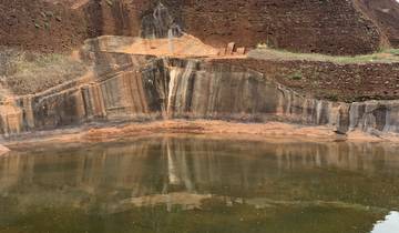 Ancient ruins with a reflection in water.