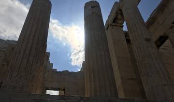 Ancient ruins with sunlight shining through the columns.