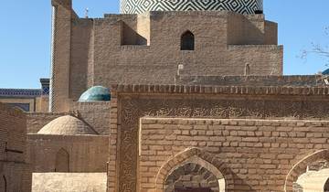 Decorative dome and wall with intricate patterns.