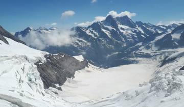 Snow-covered mountains with a stunning valley view.