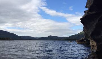 Scenic lake with mountainous background.