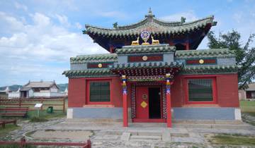 Traditional temple with colorful architecture and blue sky.