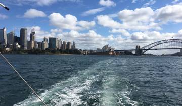 Sydney skyline and Opera House viewed from the water.