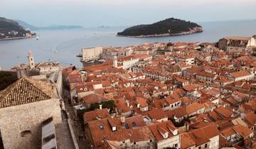 Aerial view of Dubrovnik's old town with its iconic terracotta rooftops.
