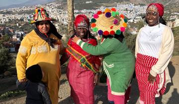Group of people in colorful traditional attire.