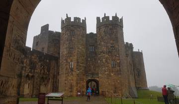 Historic castle viewed through an archway.
