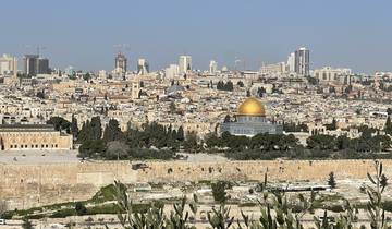 Panoramic view of a city with the Dome of the Rock.
