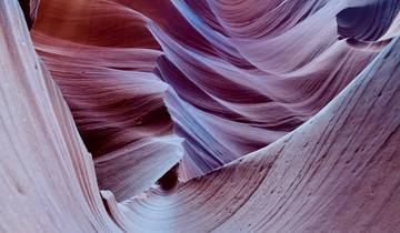 Curved rock formations in a canyon.
