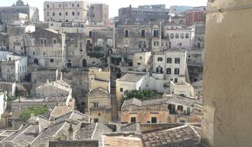 Panoramic view of a historic town with stone buildings.