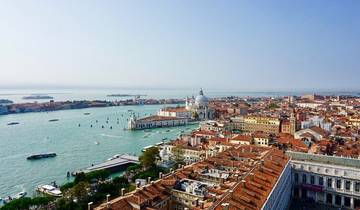 Aerial view of Venice with its waterways and historic architecture.