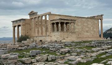 Ancient ruins with a cloudy sky above.