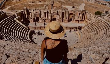 A person overlooking the Roman theater in Jerash.