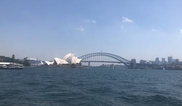 Sydney Opera House and Harbour Bridge viewed from the water.