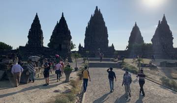 Tourists walking towards Prambanan Temple.