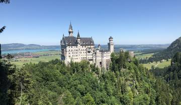 Neuschwanstein Castle in the countryside with a lake