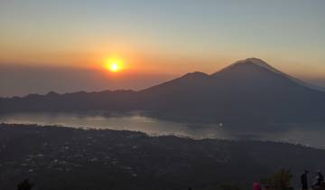 Sunset view over mountains and lake