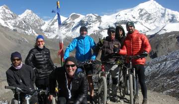 Group of cyclists at the Himalayas.