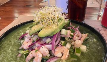 Salad with shrimp, avocado, and sprouts.