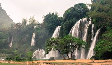 Beautiful cascading waterfalls with lush greenery.