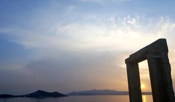 Silhouette of an ancient gateway with a sunset.