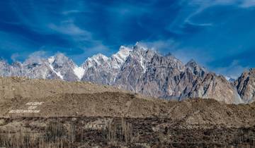 Mountain range with a clear blue sky.