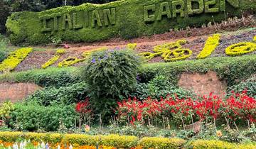 Colorful flower bed with the words 'Italian Garden' shaped by plants.