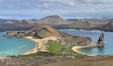 Aerial view of a volcanic peninsula with beaches.