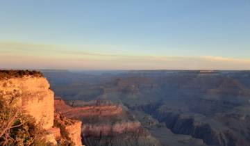 Expansive canyon vista with colorful strata.