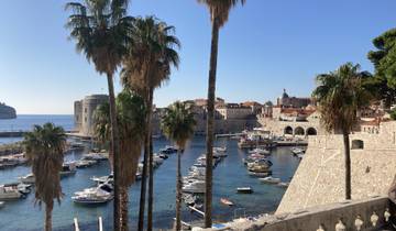 View of Dubrovnik harbor with boats.