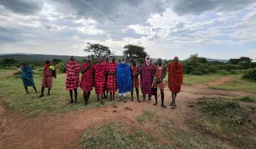 Group photo of Maasai people in traditional attire.