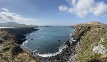 Scenic coastal landscape with rocky shores and ocean.
