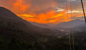 Colorful sunset over mountainous landscape.