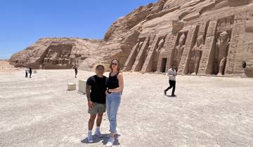 Two tourists in front of the Abu Simbel temple