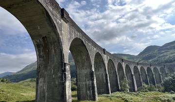 Iconic viaduct spanning across a lush landscape.