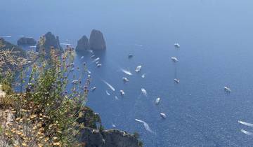 Aerial view of the Mediterranean Sea with islands in the distance.