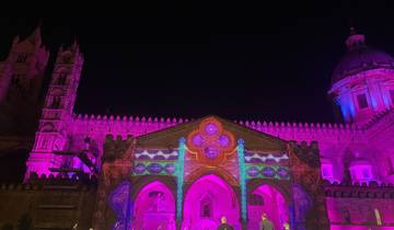 Building illuminated with colorful lights at night