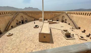 Interior courtyard of a fortress with staircases.