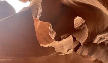 Antelope Canyon with smooth wave-like rock formations.